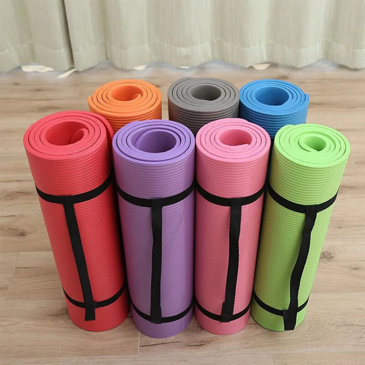 A thick yoga mat that protects knees and back during exercise.