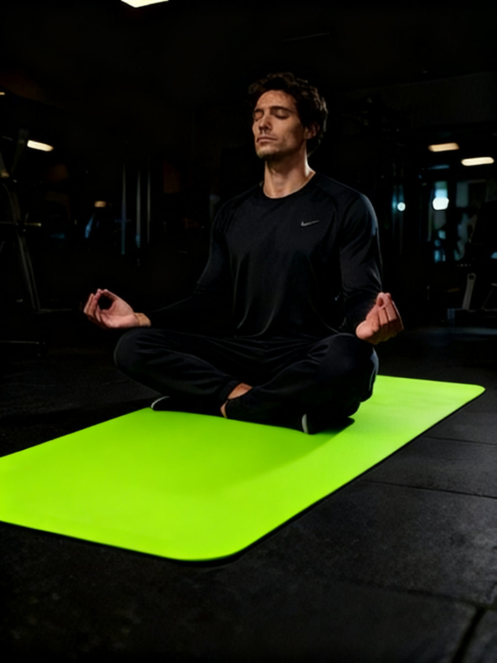 A thick yoga mat that protects knees and back during exercise.