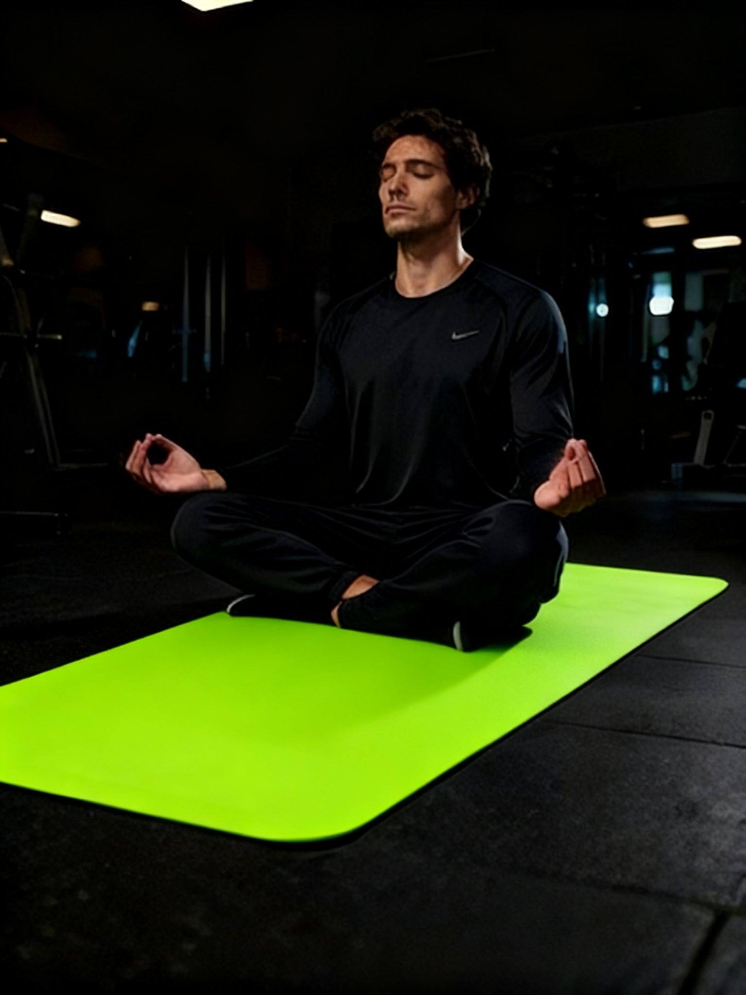 A thick yoga mat that protects knees and back during exercise.
